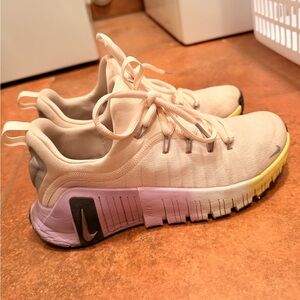 Nike Women’s Cream Pink Training Sneakers with Lavender and Yellow Gradient Sole